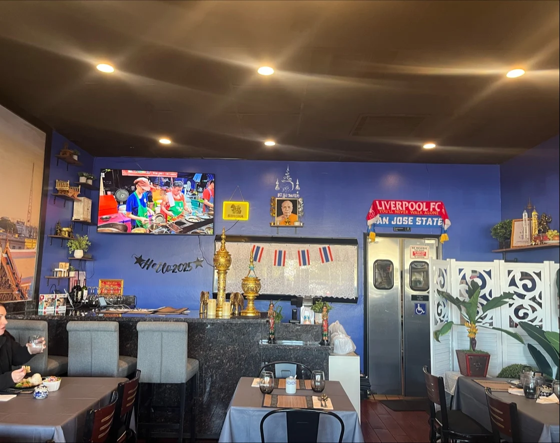 Interior dining room and bar area of Thai Soul Kitchen located on Almaden Expressway in San Jose, featuring authentic decor.